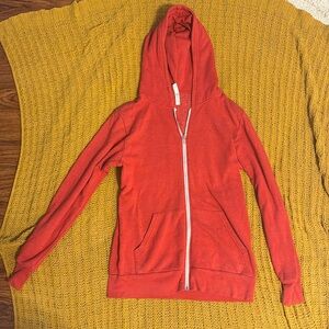 Red zip up sweater